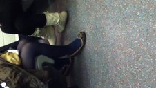 Blue pantyhose and flats on train