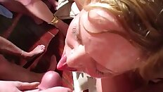 Blonde bukkake in a club