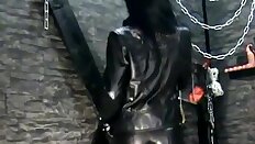 Domme - leather, heels + smoking