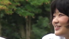 Cute Japanse schoolgirl with pigtails pisses in the wind
