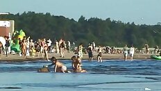 Spy nude girl picked up by voyeur cam at nude beach