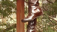 Leather boots shoeplay dangling