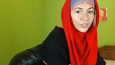 Muslimgirl in lovely leather skirt