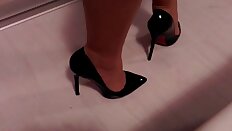 Teasing with high heel shoes and nylon legs