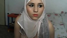 Nude woman that is Arabic does show in a scarf
