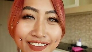 Pierced Thai teen bargirl Fang taking care of a hard white cock. Skinny inked amateur Thai teen bargirl Fang with small tits gets naked revealing her pussy which matches her bikini and hair color then she gets on her knees to suck her clients hard white c